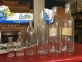 divers anciennes bouteilles de lait , vin, pharmacie , spiritueux.... | Puces Privées