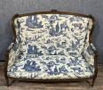 Rare banquette Parisienne de caquetoire Louis XVI en noyer vers 1850. | Puces Privées