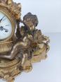 Horloge pendule Impérial en bronze doré décor angelots style Louis XVI | Puces Privées