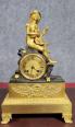 Pendule au Troubadour en bronze patiné et doré Epoque Empire vers 1810 | Puces Privées