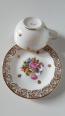 Tasse et soucoupe fleurie en porcelaine de Limoges | Puces Privées